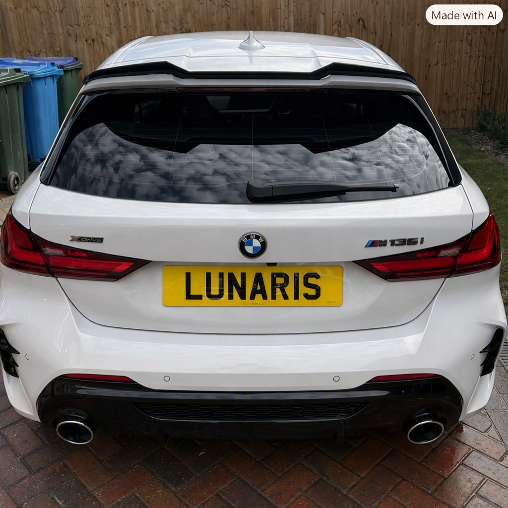car on a driveway after detailing